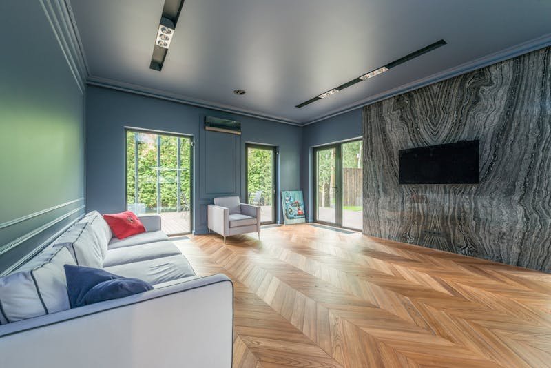 Modern finished living room with smooth walls